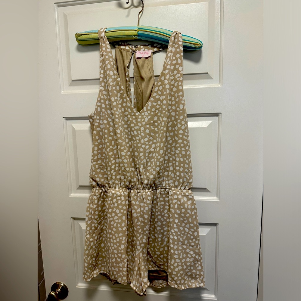 Pink Lily Romper “Won’t Break Your Heart” in Spotted Taupe. Never been worn.